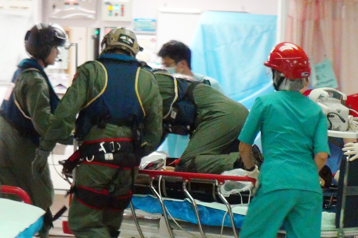 Paramedics giving medical care to the victim at Pamela Youde Nethersole Eastern Hospital.