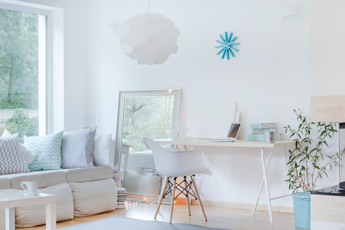A neutral palate with pops of colour can make your room feel bigger.