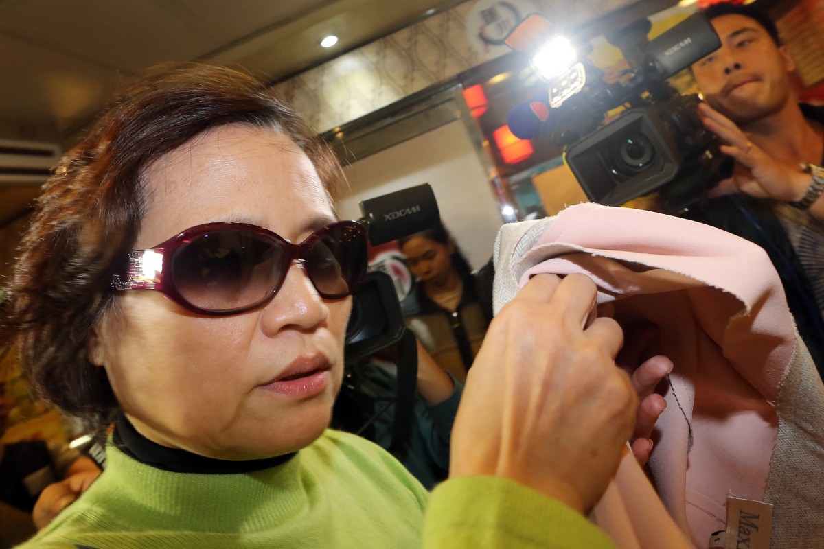 Sophie Choi Ka-ping, the wife of the missing book seller Lee Bo, appears in North Point on January 6, 2016.