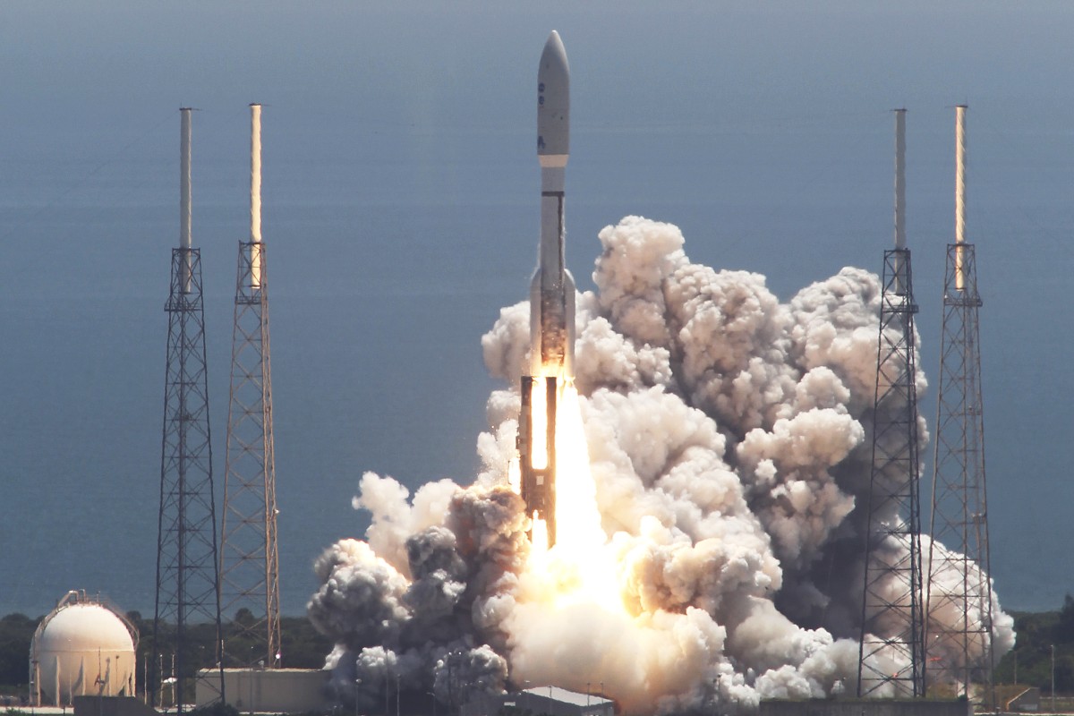 Atlas V rocket carrying the Juno space probe lifts off from Cape Canaveral in Florida.