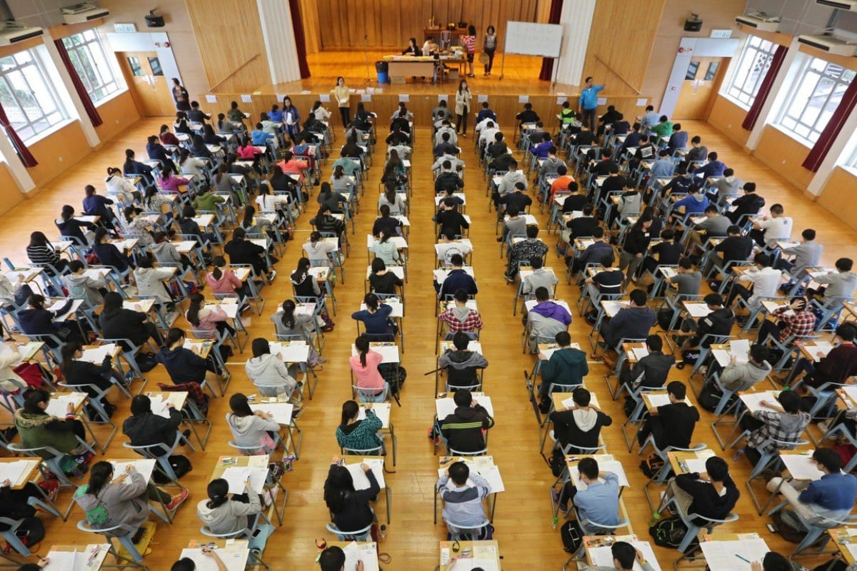 Students sitting the Hong Kong Diploma of Secondary Education examination at the Kowloon Technical School in Sham Shui Po.
