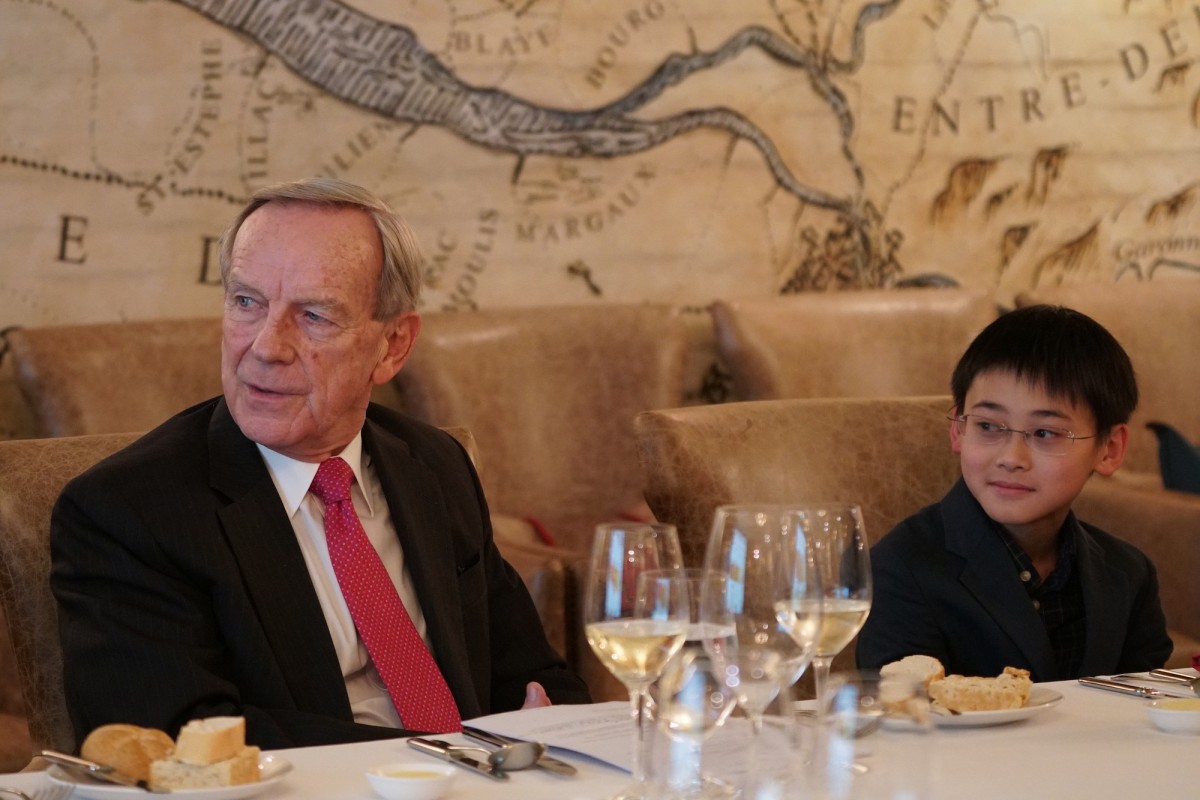A mentee meets Jim Thompson, founder of The Crown Worldwide Group through Time Auction.