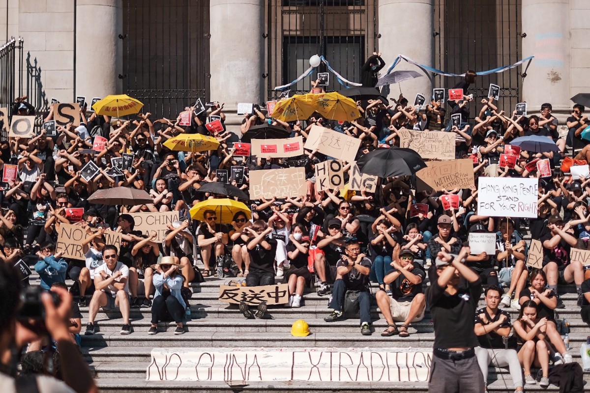 Students gathered in front of the Vancouver Art Gallery in Canada for a sit-in protest.