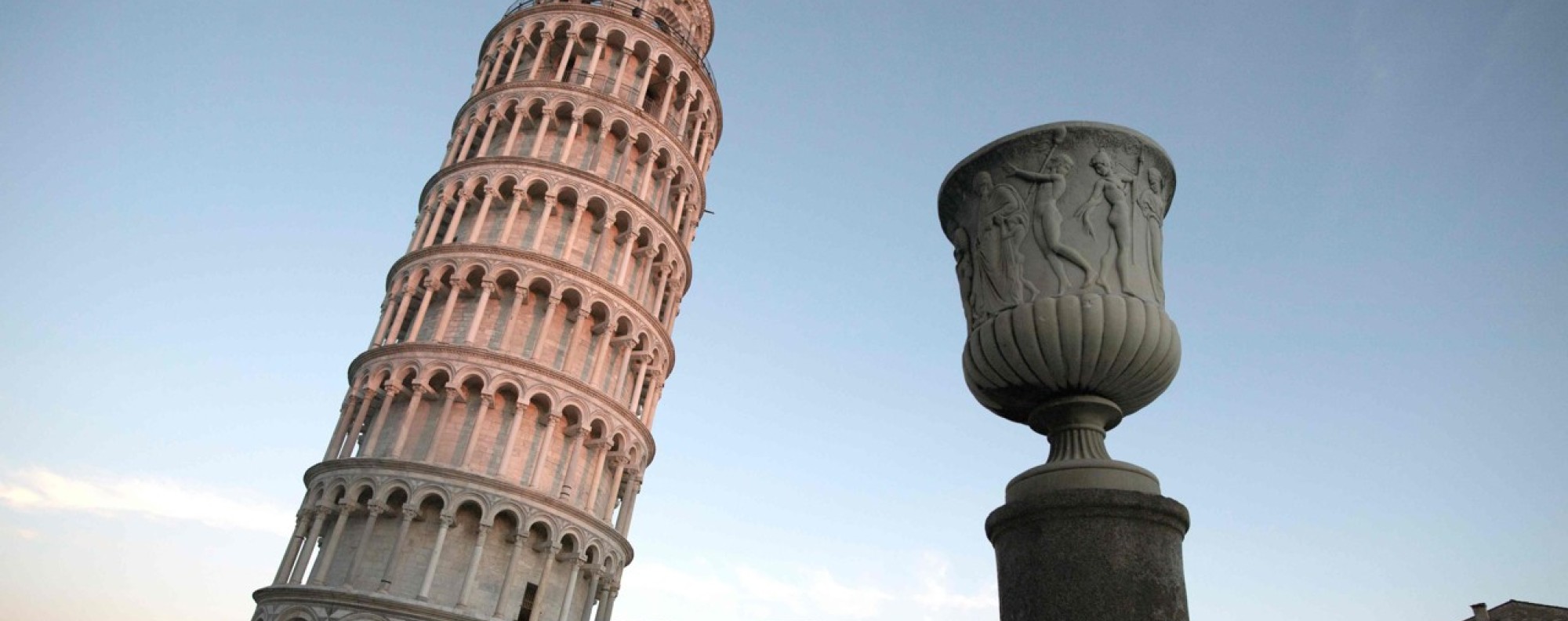 a) Side view of the Tower of Pisa with indication of the years of