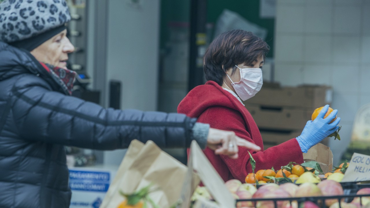Chinese migrants in Italy assess their options amid outbreak of coronavirus and racism