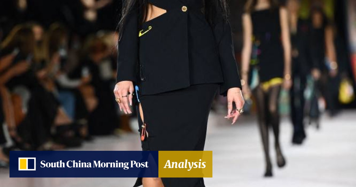 Dua Lipa electrified at Versace's Milan Fashion Week show, with