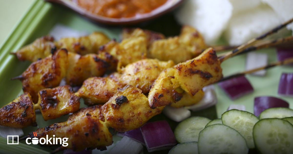 Chicken satay with pressed rice (nasi impit)-image
