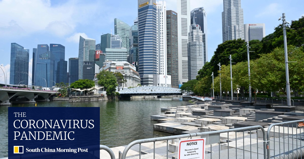 Singapore reimposes coronavirus curbs as karaoke bar cluster upends
