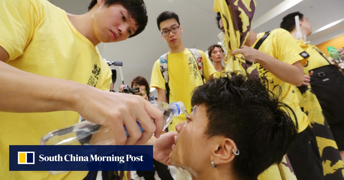 Police pepper spray Hong Kong activists at electoral reform talk as