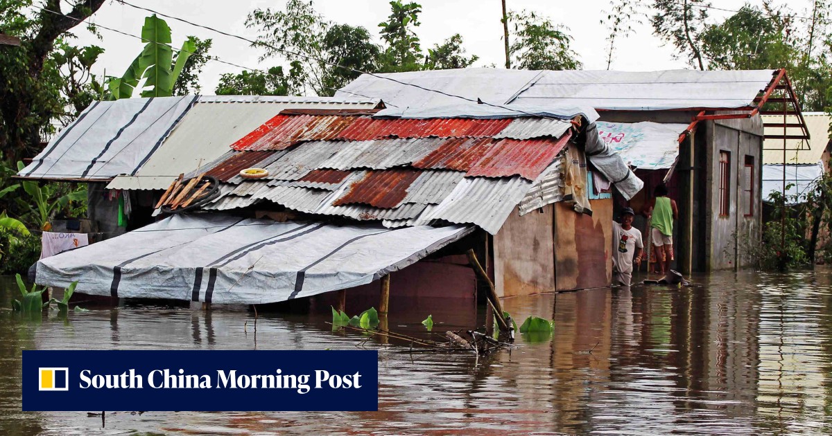 54 dead, thousands forced to flee homes after storm batters Philippines ...