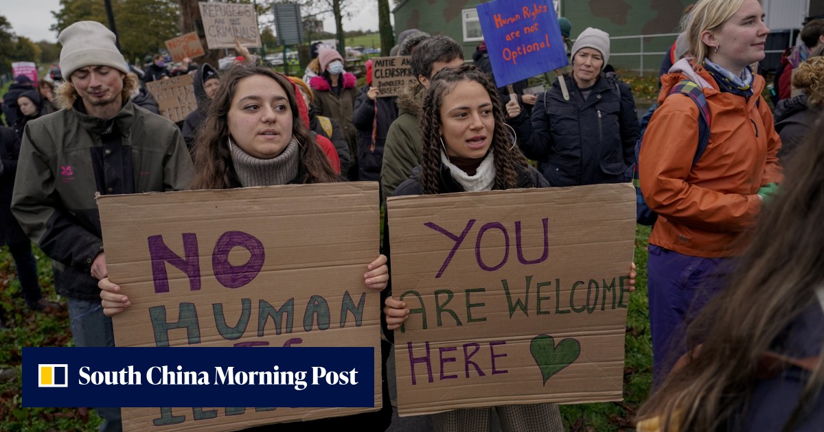 Hundreds protest outside UK migrant centre as government pledges to ...