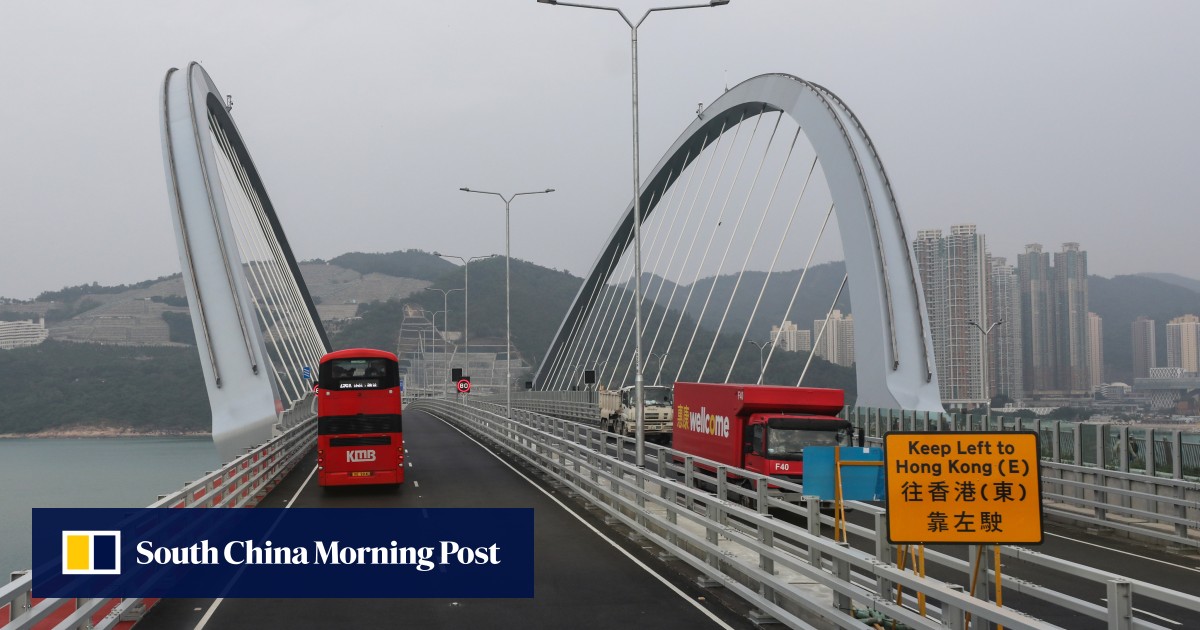Traffic zips along new Hong Kong bridge, but what happens after