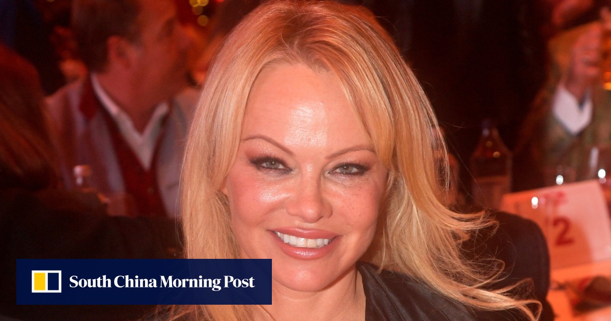 Julian Assange’s mother told Pamela Anderson to downplay sexy image: memoir