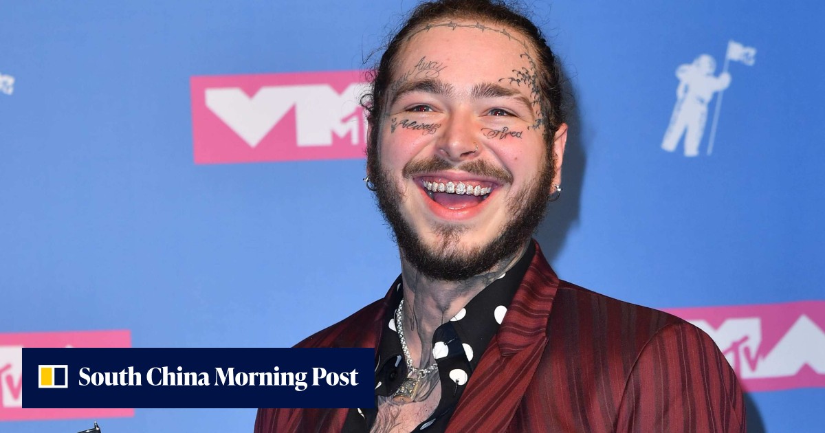 American Rapper Post US singer Post Malone denied entry into Australia bar over his tattoos ...