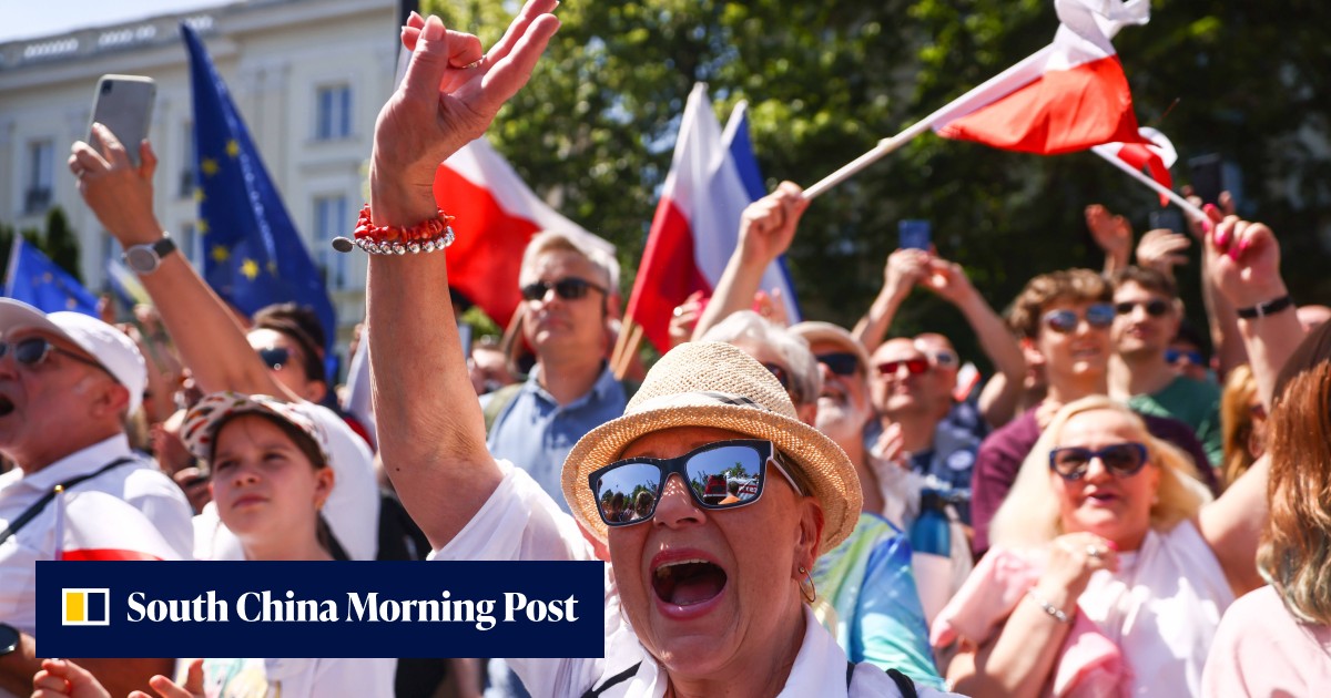 Hundreds of thousands march in Poland anti-government protests in support of democracy