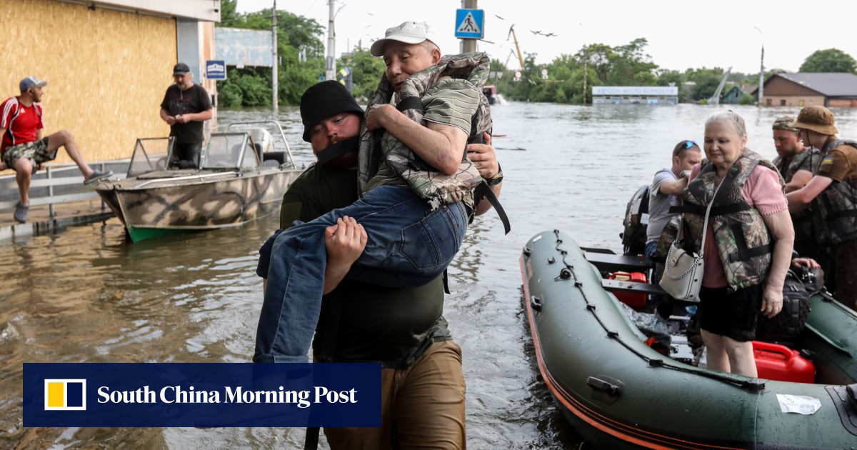 Russian troops firing on Ukrainian rescuers after dam blast, Volodymyr Zelensky says