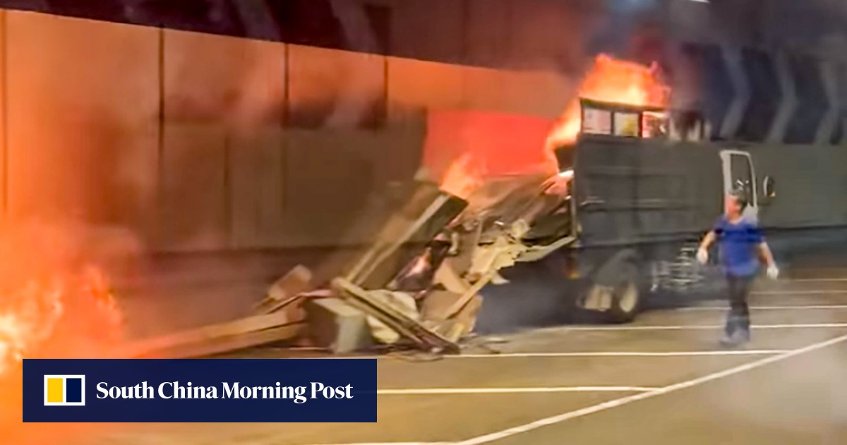 Hong Kong truck driver escapes unscathed after vehicle catches fire