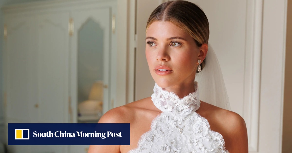 Sofia Richie is walked down the aisle by dad Lionel during lavish