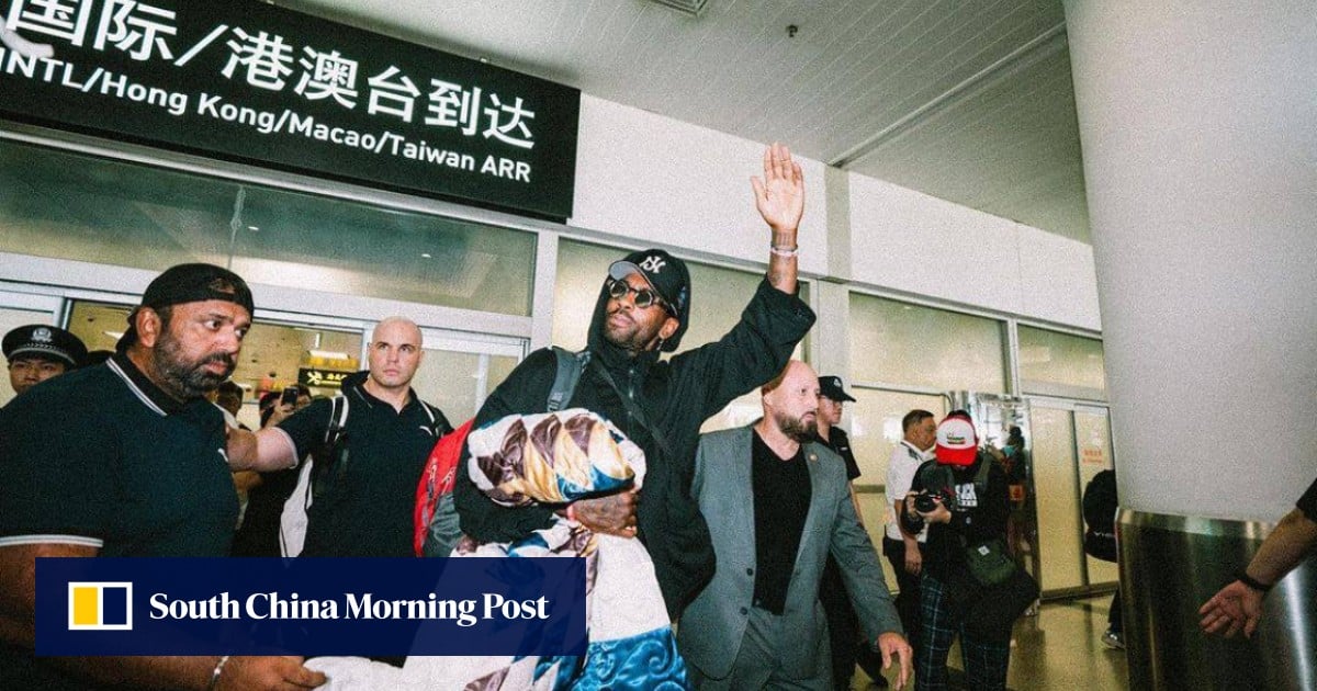NBA’s Irving arrives in China for tour, mobbed by fans at airport
