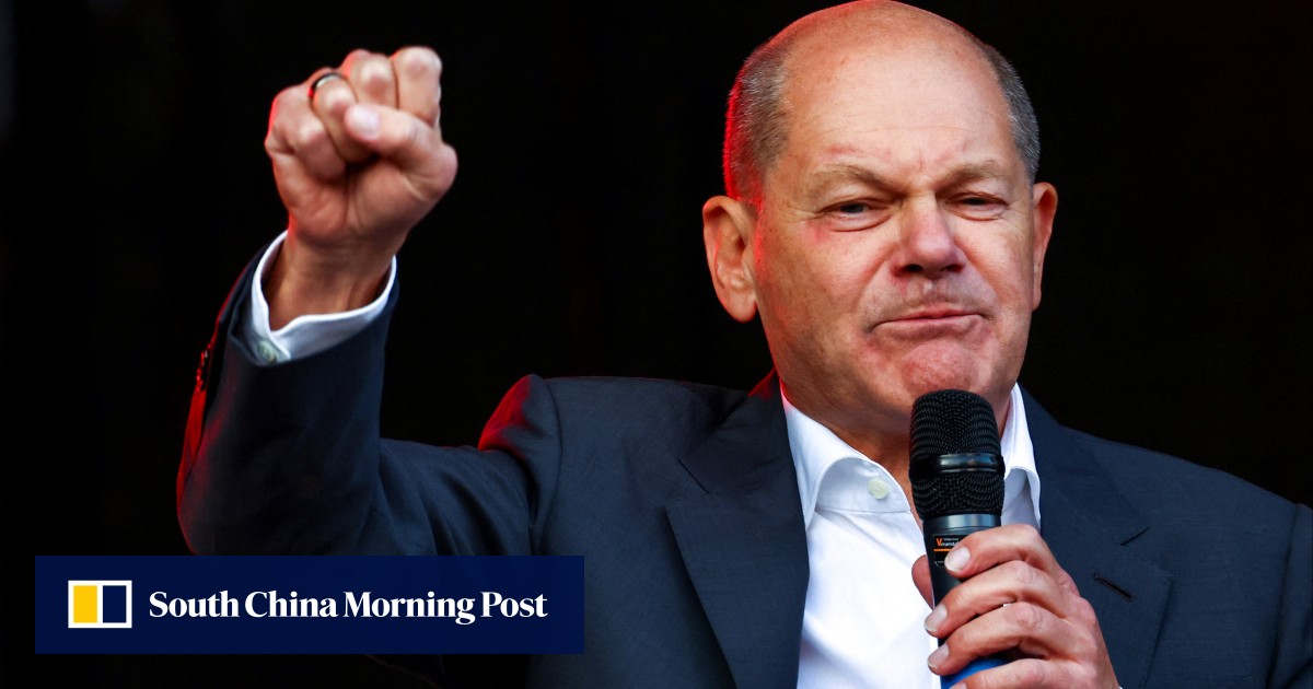 Germany’s Olaf Scholz threatens Poland with border checks amid cash-for-visas scandal