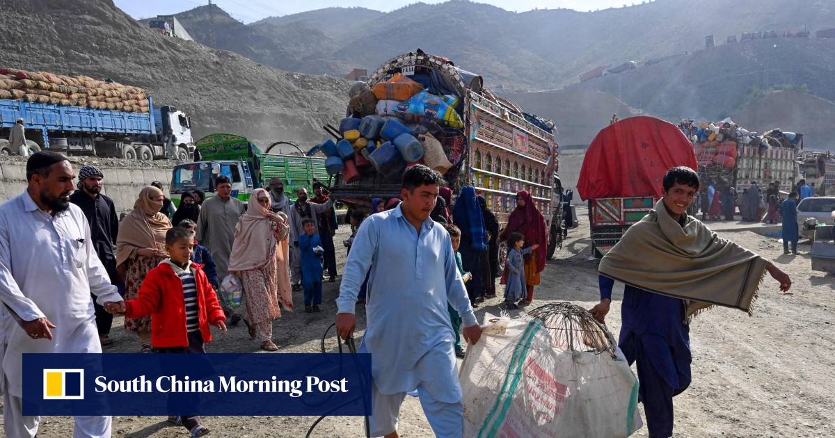 Afghans leave Pakistan ‘with a heavy heart’ as it forces out settled migrants to protect ‘welfare and security’
