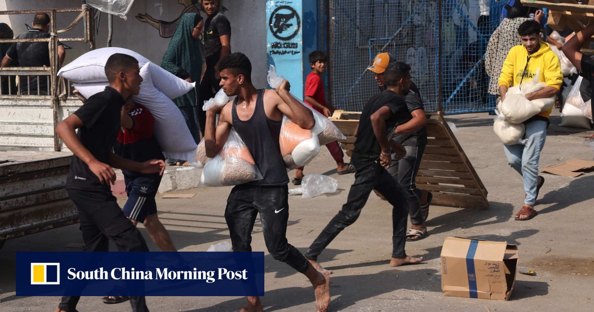 Thousands break into aid warehouses in Gaza, a sign ‘civil order’ is collapsing, warns UN