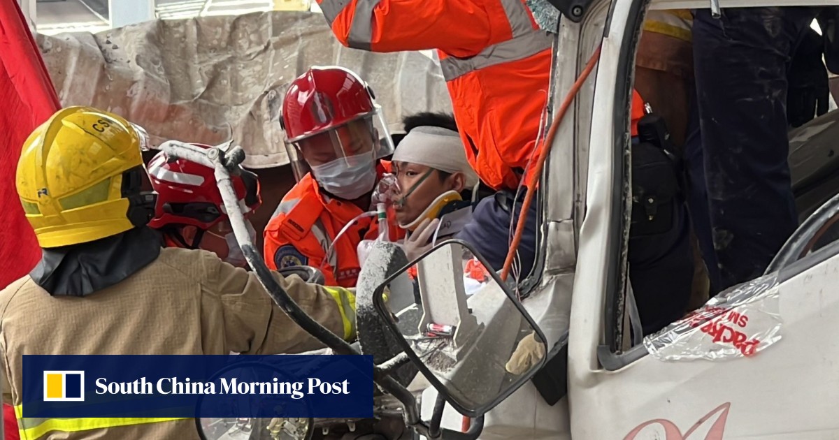 Trapped driver, 29, rescued after truck carrying gravel collides with Ferrari on Hong Kong highway, causes hours-long traffic delay