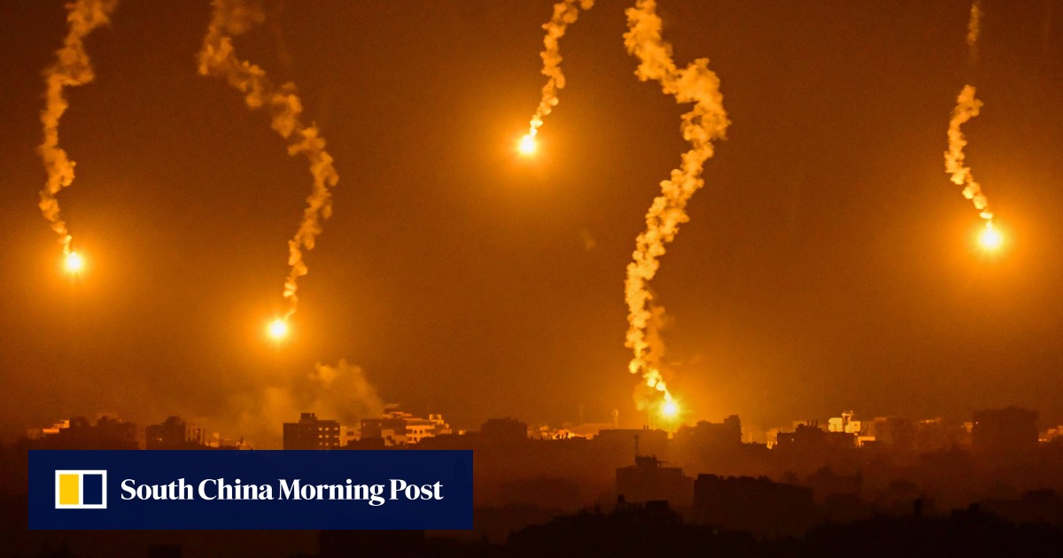 Israel’s military says it has surrounded Gaza City; Gaza loses telecoms contact again