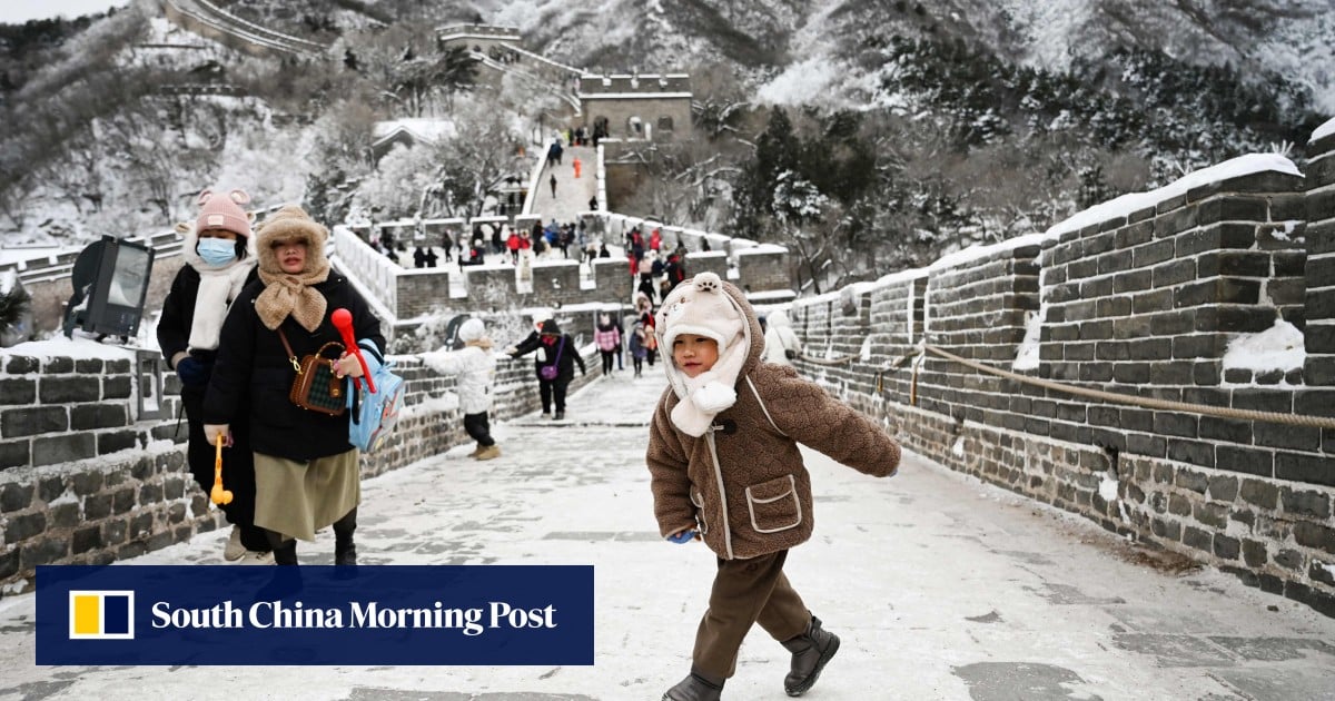‘It’s warmer in the fridge’: cold snap freezes China, bringing snow, accidents and school closures