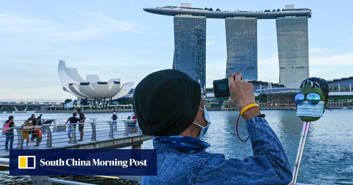 Worried Singaporeans mask up amid rise in Covid-19 cases but won’t ‘dwell on it’
