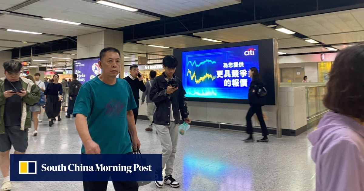 Hong Kong stocks rise for third day as China pledges monetary easing, top banks cut deposit rates to aid recovery