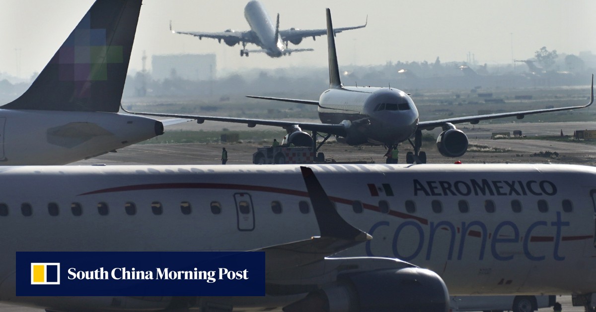Angry passengers back man who opened emergency exit and walked on plane’s wing at Mexico airport