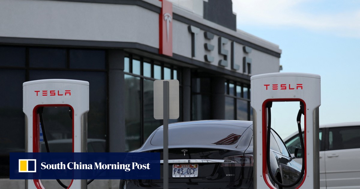 Tesla to recall nearly 2.2 million vehicles for software update to fix warning lights that are too small