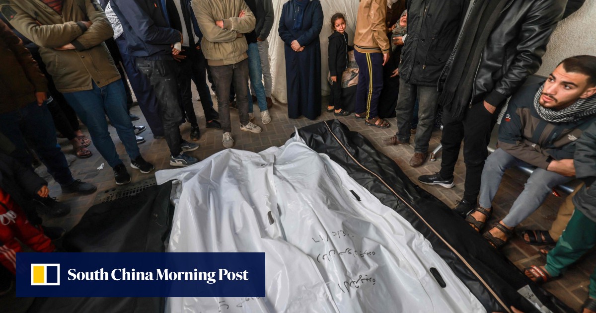 Israel detains 100 in Gaza as fears grow for patients and staff in raided hospital