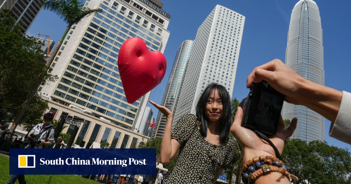 Hong Kong’s ‘Chubby Hearts’ will go on … as 12-metre art piece returns to Central after weather forced ‘short break’