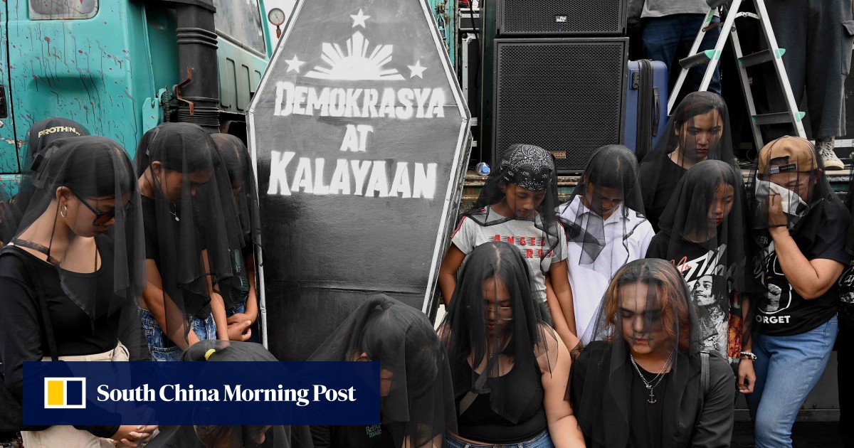 Philippine protesters say ‘never again’ on anniversary of anti-Marcos uprising