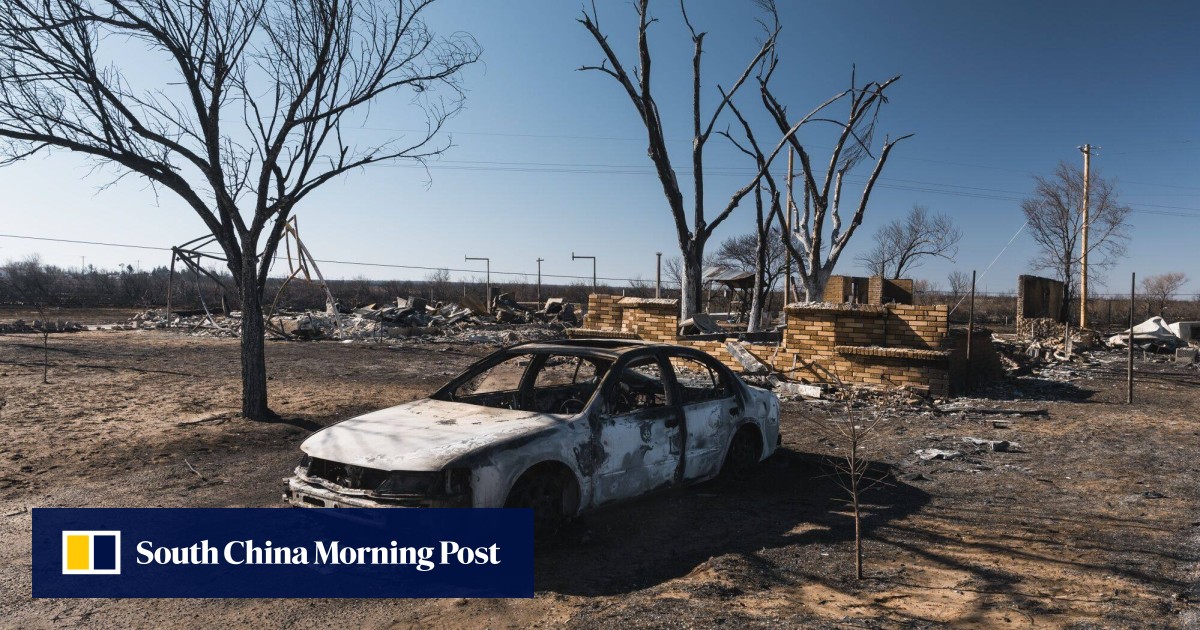 US firefighters face difficult weather conditions as they battle largest wildfire in Texas history