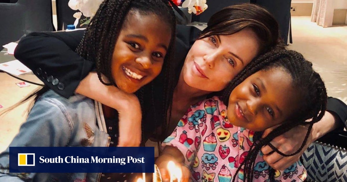 Who are Charlize Theron's children, Jackson and August? The Old Guard actress' adopted daughters go to Disney World, and the eldest is an emerging LGBT role model who attends Dior shows with