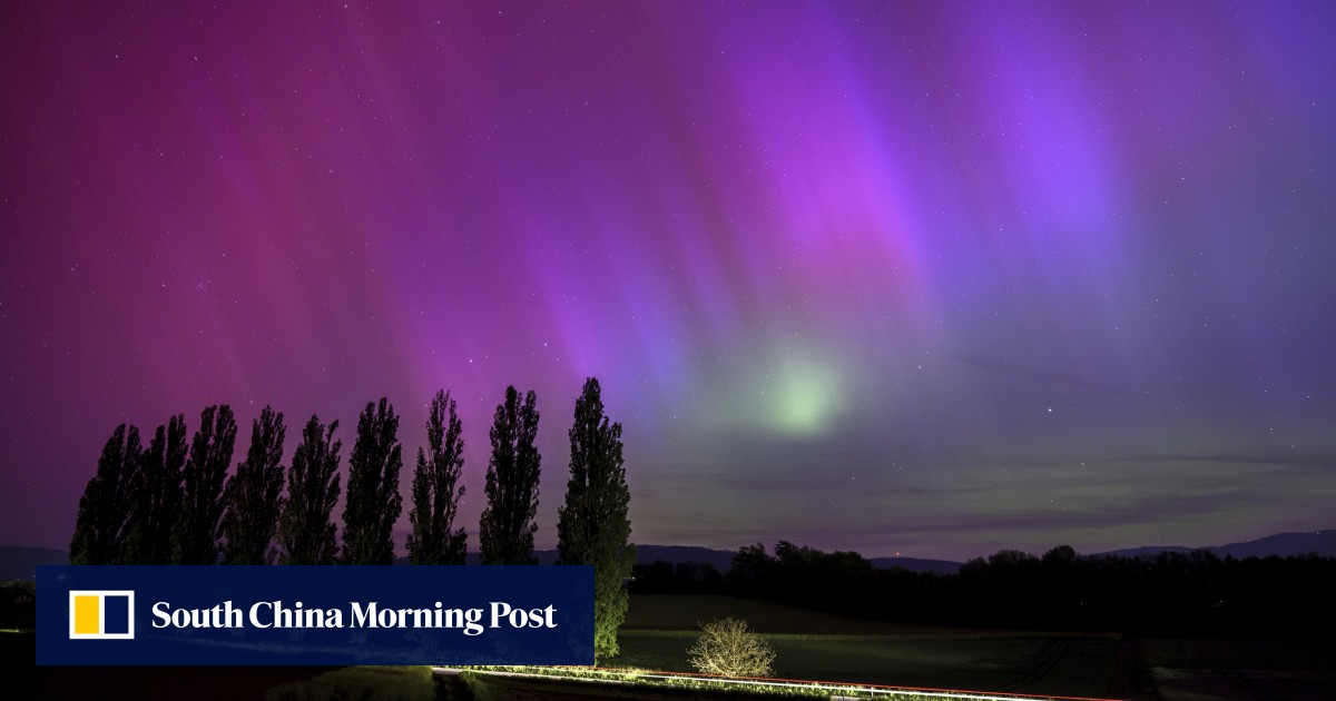 Auroras sparkle as massive solar storm strikes Earth, threatening to disrupt satellites, power grids