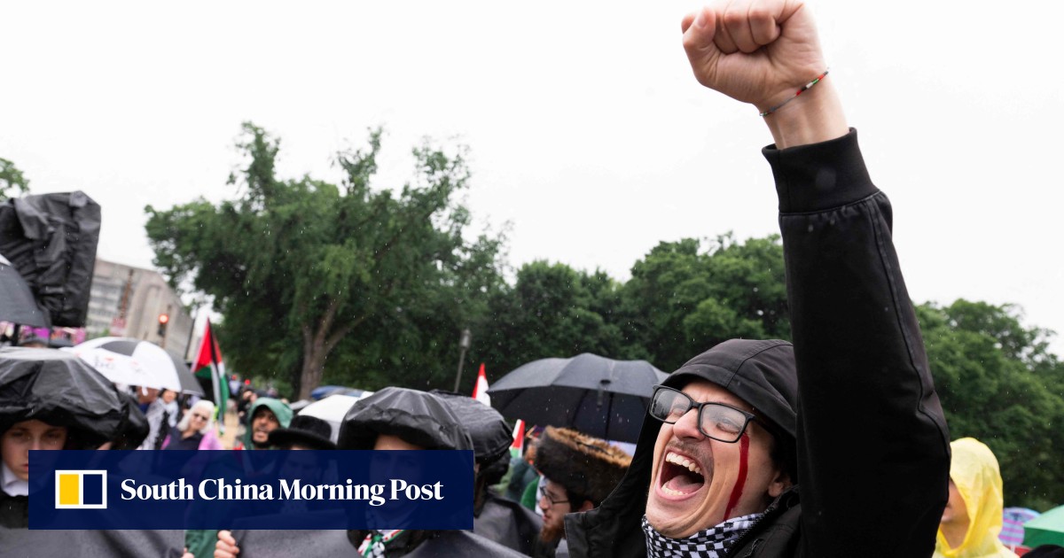 In Washington DC, hundreds of pro-Palestinian protesters rally in rain to mark painful past and present