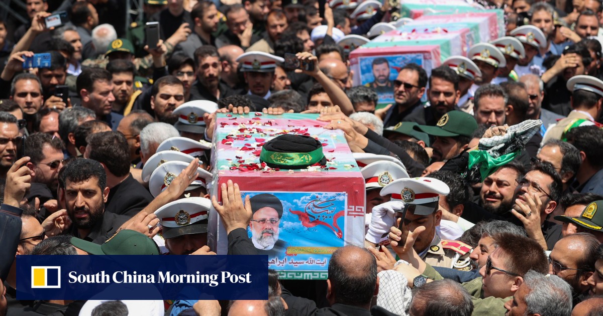 Mourners pack Iranian city of Mashhad for President Ebrahim Raisi’s burial