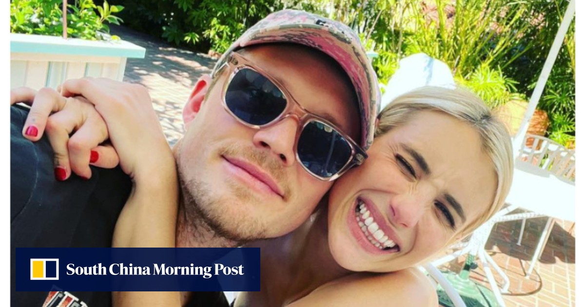 Who is Emma Roberts’ budding actor BF, Cody John? The couple do Coachella and Lacoste fashion show together, but did he really move into the American Horror Story star’s house in Hollywood Hills?