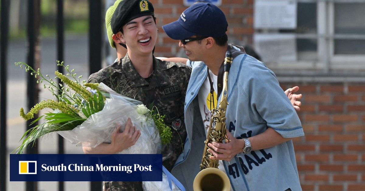 ‘I cried’: oldest member of K-pop group BTS Jin exits military service in South Korea
