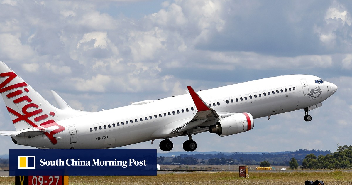 Virgin Australia plane engine catches fire in New Zealand after ‘possible bird strike’