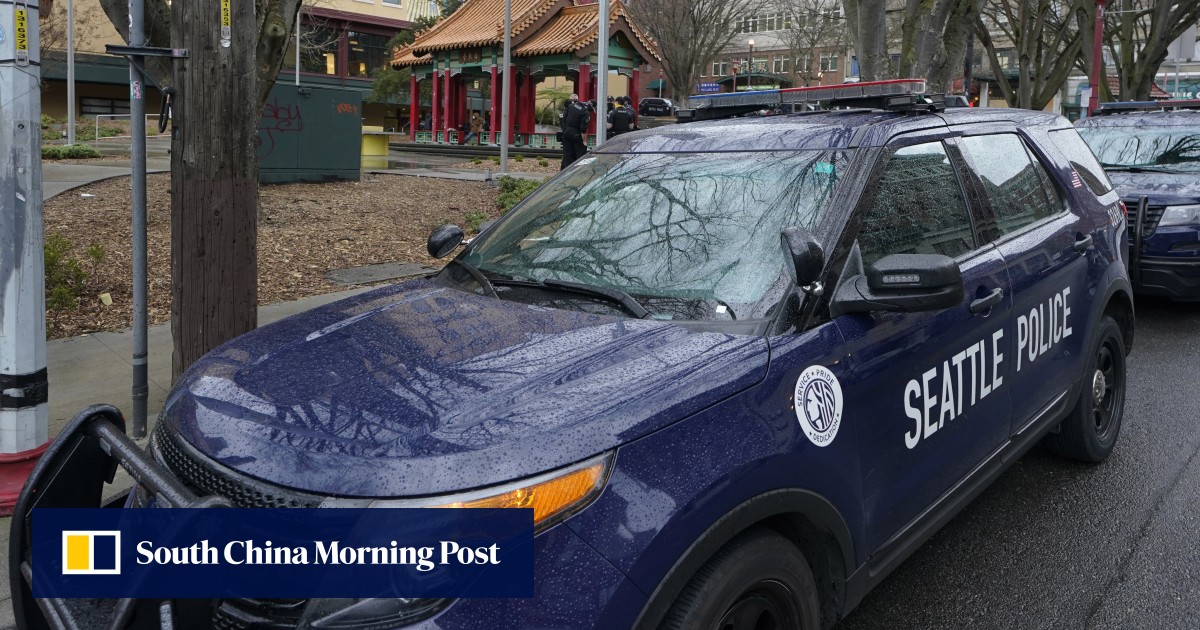Seattle police officer fired after hurling racist, sexist slurs at Chinese-American neighbour