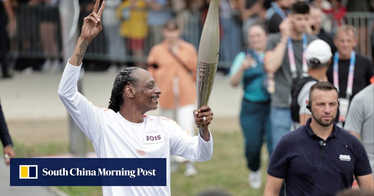 Snoop Dogg enjoying Paris Games, carries Olympic torch ahead of opening