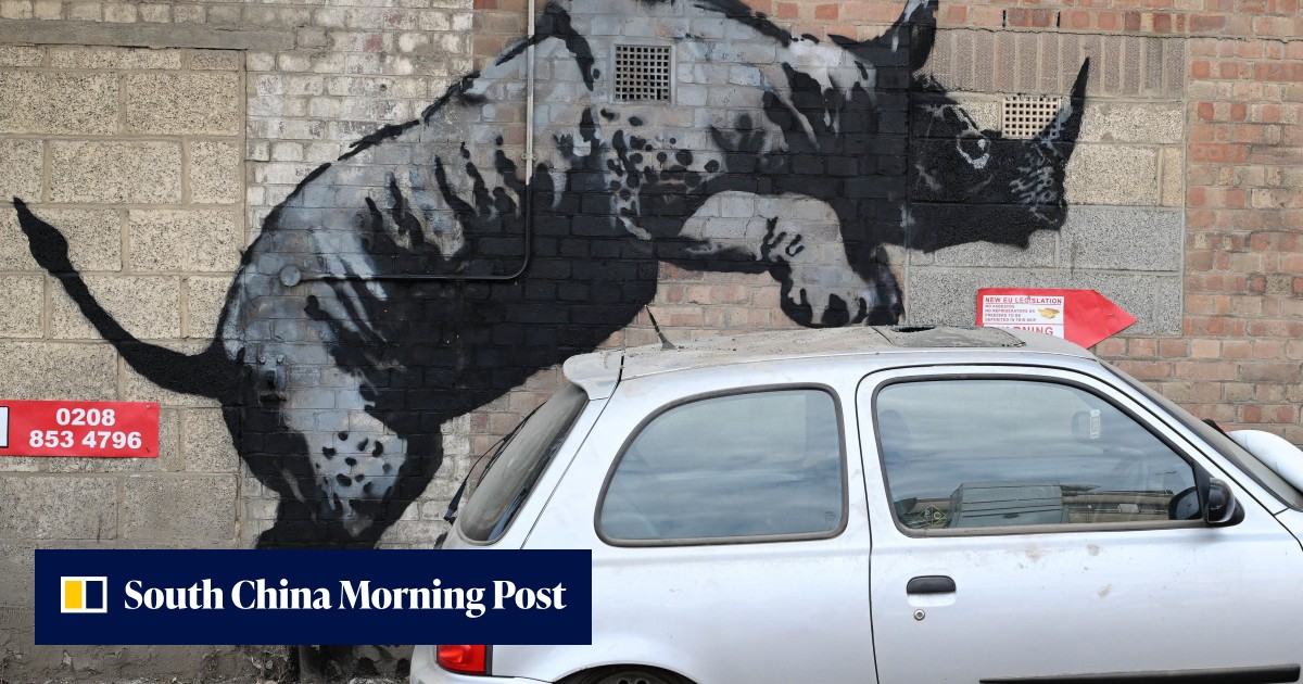 Banksy’s latest animal themed artwork depicts a rhino mounting a car Banksy’s latest animal themed artwork depicts a rhino mounting a car