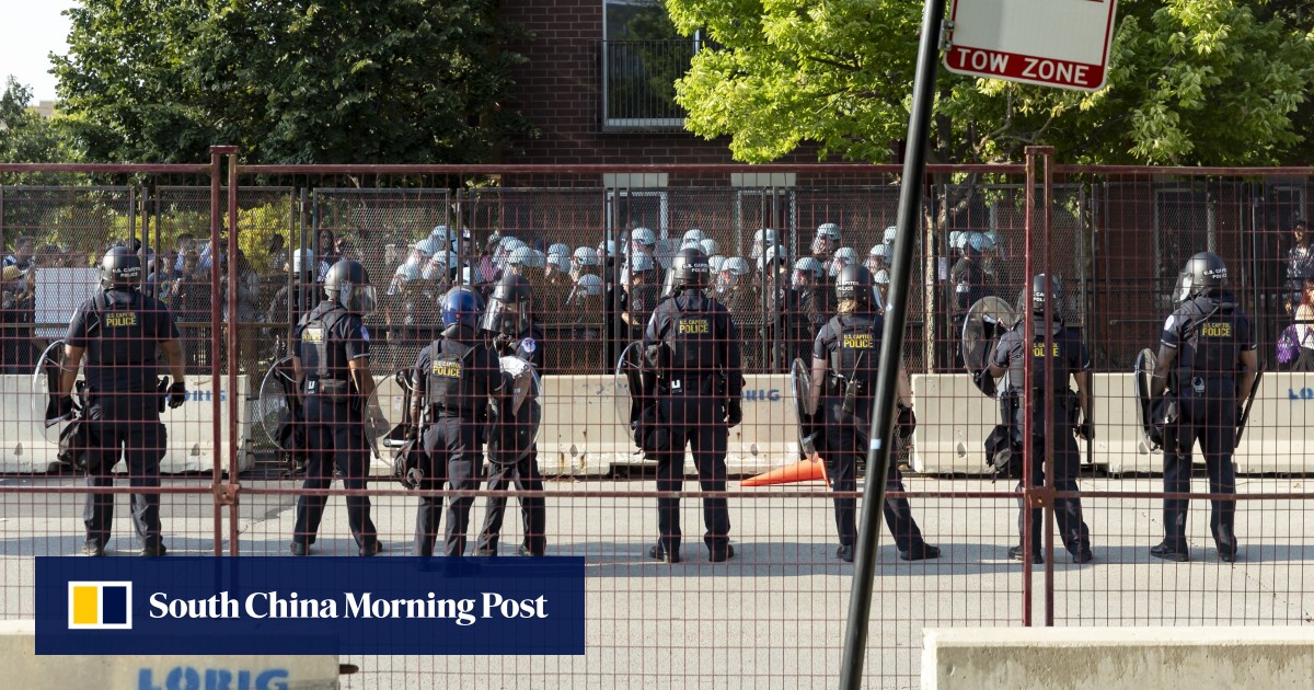 Gaza war protesters break through security fence near DNC site on opening day