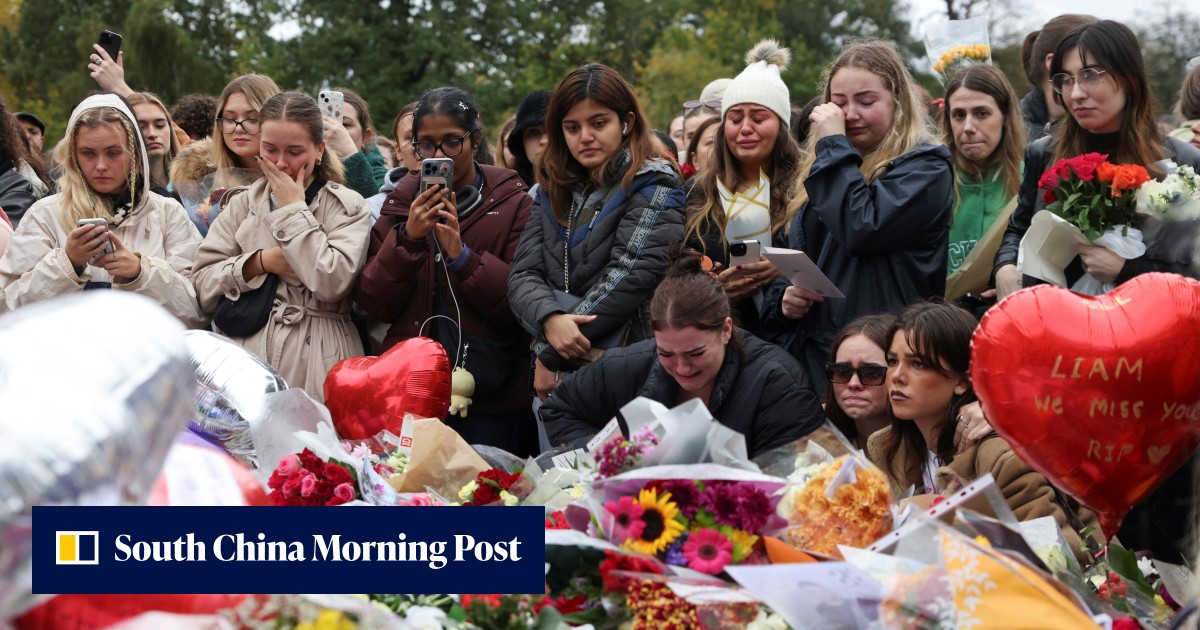 Fans mourning One Direction singer Liam Payne leave tributes in London ...