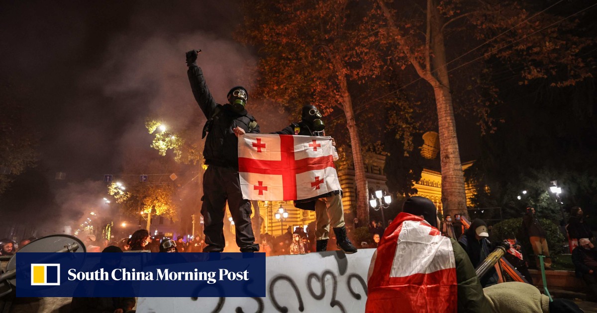 Third night of protests after Georgia suspends EU talks